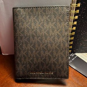Michael Kora passport wallet